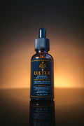 OILTEA Nourishing Skin and Hair Oil in a 1 fl oz amber glass dropper bottle, front view